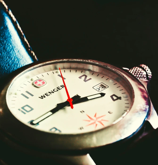 analog watch with red accent